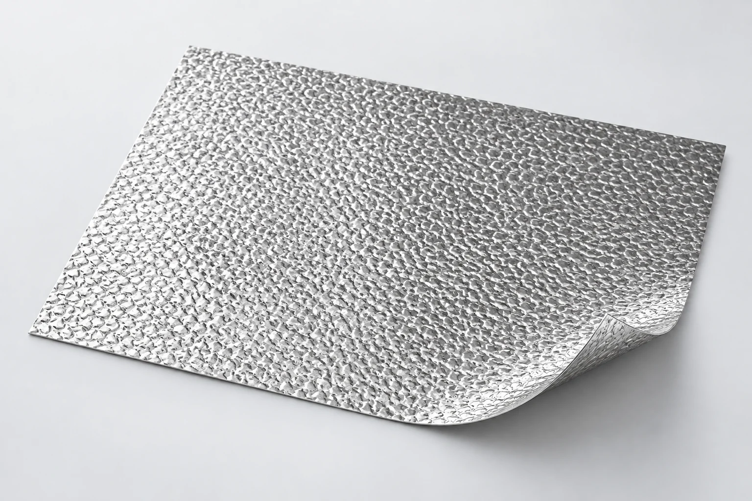 Aluminium sheet with an irregular stucco embossed texture